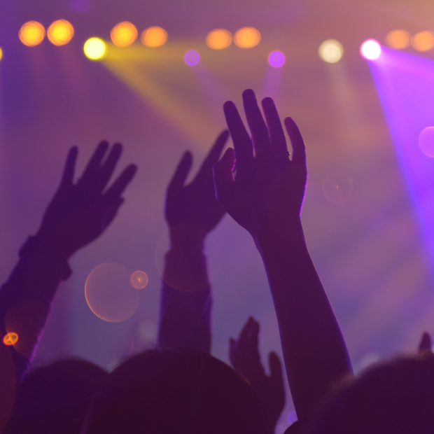 Hands up at what looks like a concert